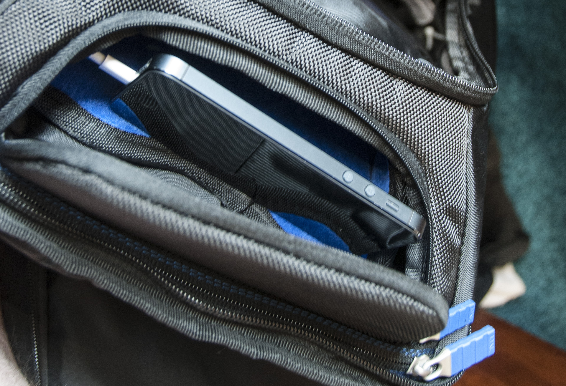 For instance, you can neatly route a cable into its well-placed "Protect Pocket," a hardened shell that's just the right size to fit your smartphone in one side of its divider, and a pair of sunglasses in the other, protecting both from hard knocks or objects piled on top.